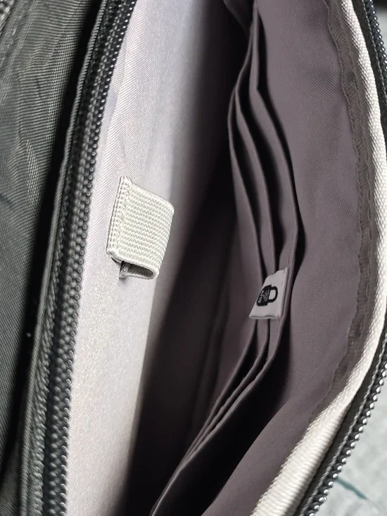 Baggallini Black Lightweight Crossbody Messenger Bag with 5 zipper compartments. - Picture 4 of 11